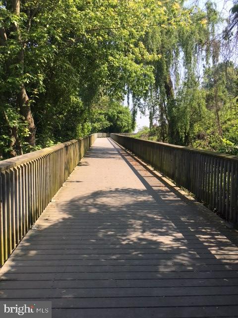 6852 Old Bayside Road Chesapeake Beach, MD 20732 - Photo 7 of 14 a view of balcony with wooden floor