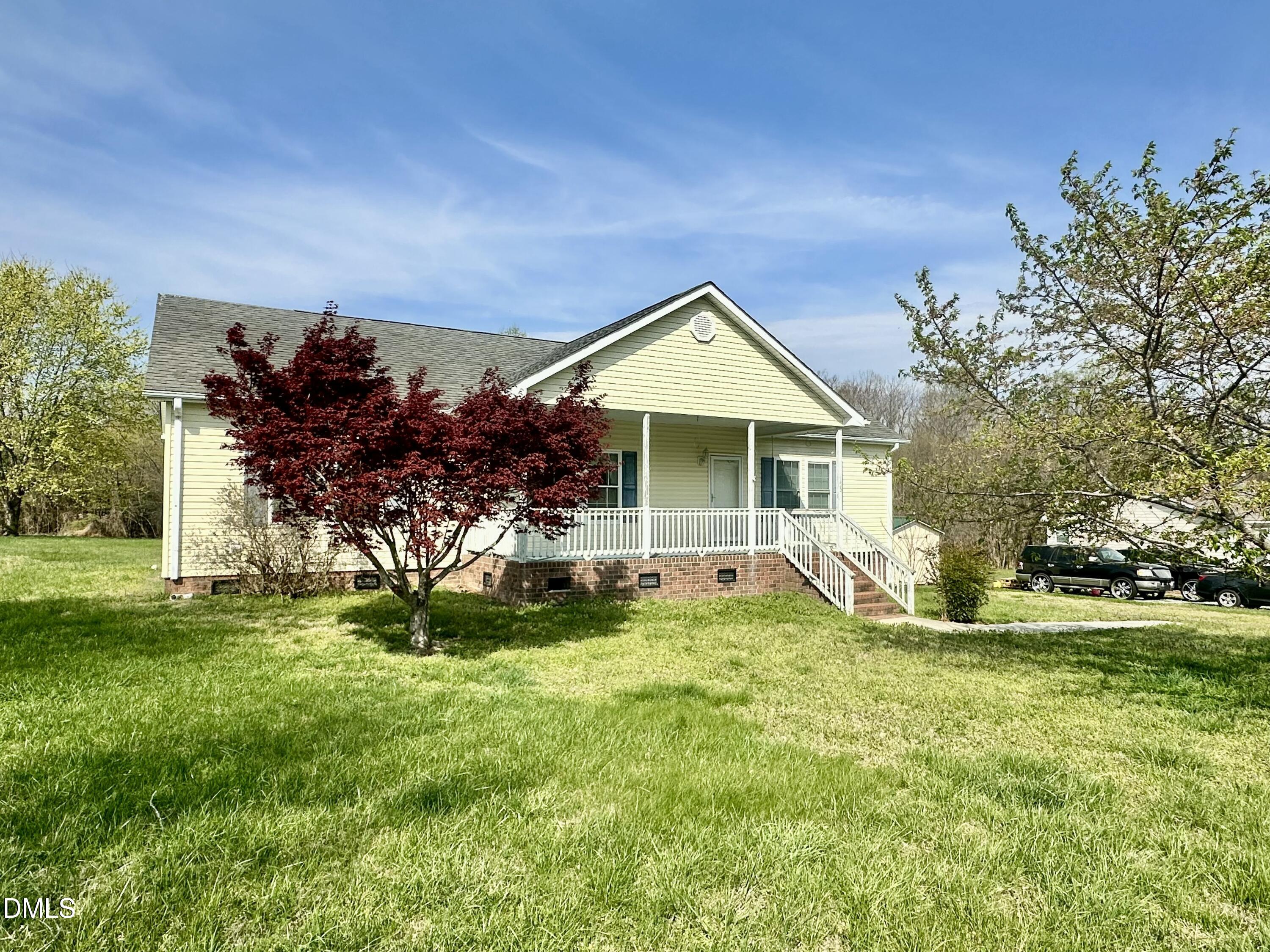 155 Collin Drive Roxboro, NC 27574 - Photo 15 of 20 a front view of a house with a yard