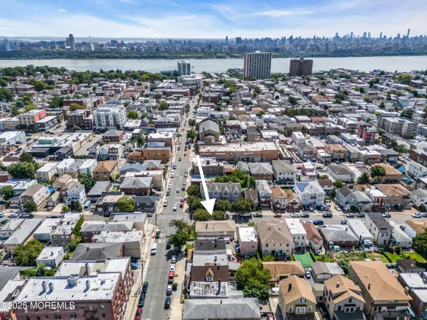 an aerial view of a city with lots of residential buildings