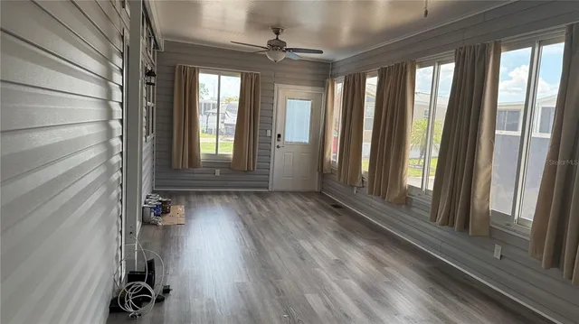 a view of entryway with wooden floor