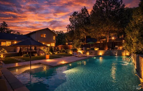 a view of a yard in front of the house