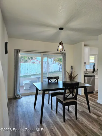 a large kitchen with stainless steel appliances kitchen island a large island in the center