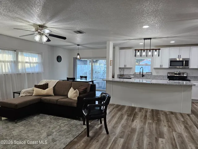 a bedroom with a bed and a table