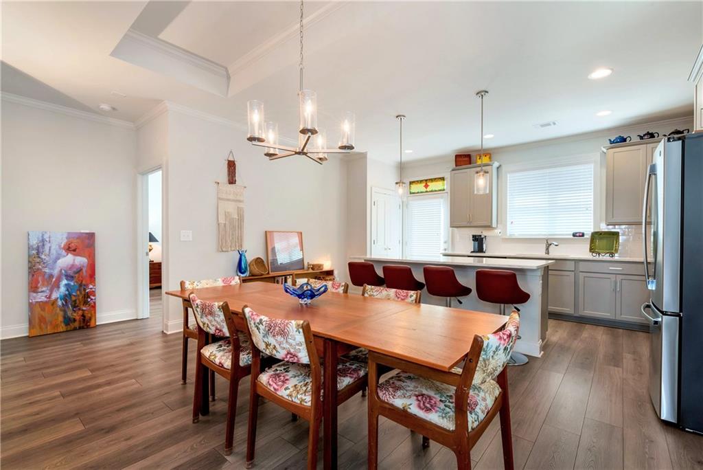 269 Grand Circle Jasper, GA 30143 - Photo 12 of 54 a view of a dining room with furniture and wooden floor