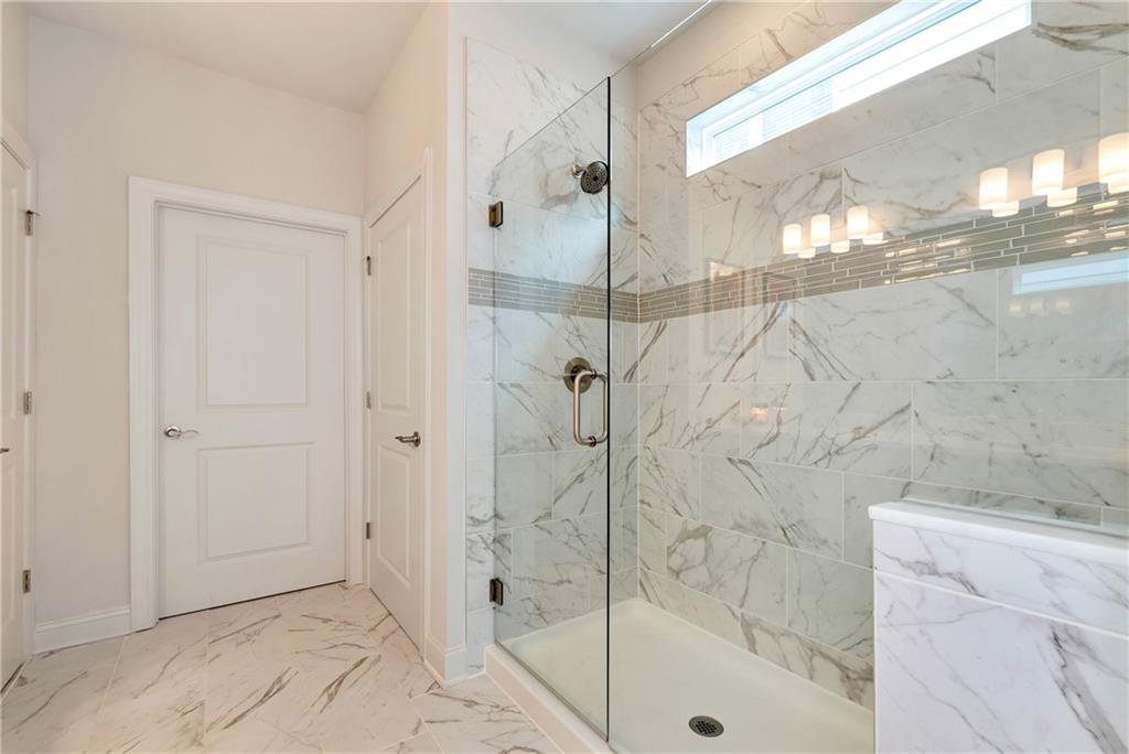 269 Grand Circle Jasper, GA 30143 - Photo 21 of 54 a bathroom with a shower