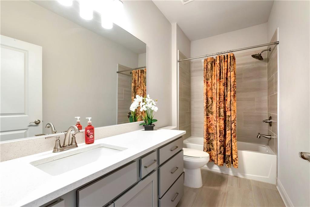 269 Grand Circle Jasper, GA 30143 - Photo 26 of 54 a bathroom with a sink a toilet and shower