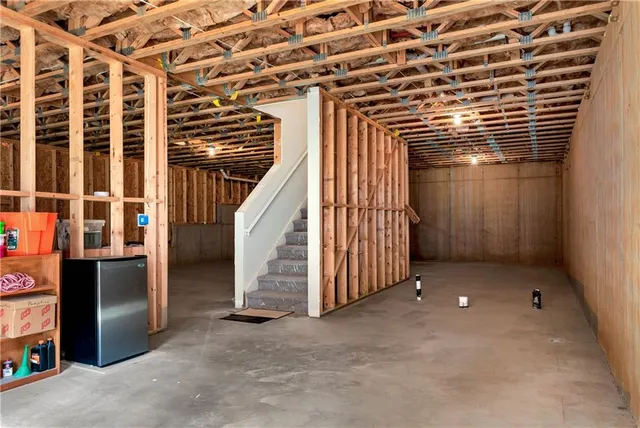 a view of balcony with wooden floor and fence