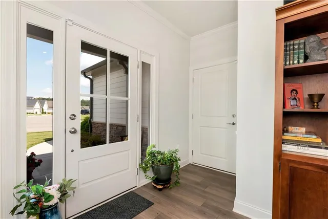 a living room with furniture and decor