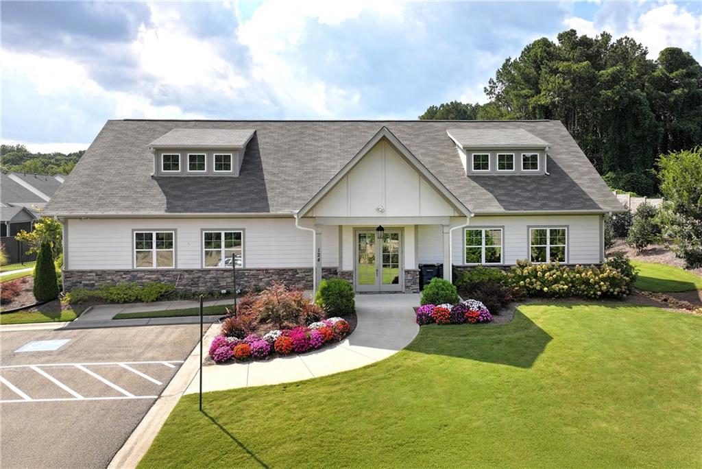 269 Grand Circle Jasper, GA 30143 - Photo 42 of 54 a front view of a house with garden