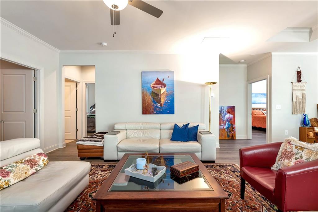 269 Grand Circle Jasper, GA 30143 - Photo 8 of 54 a living room with furniture a rug and a chandelier