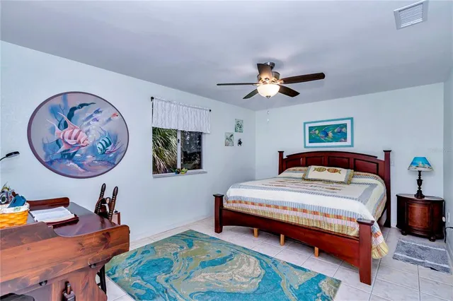 a reading room with furniture and rug