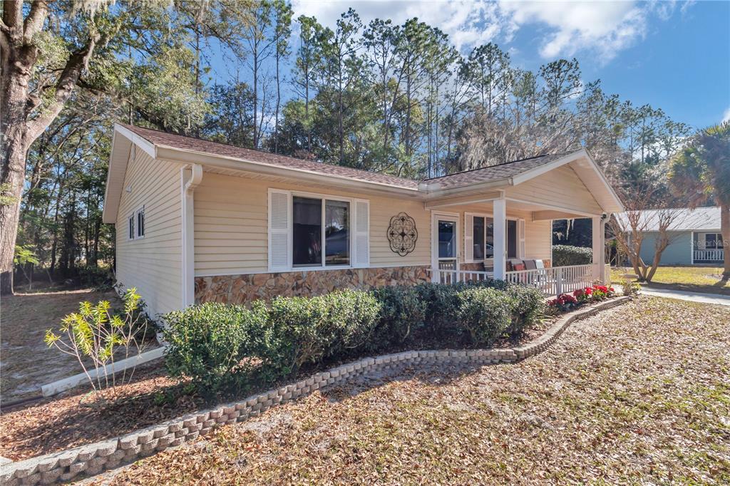 10901 Southwest 80th Court Ocala, FL 34481 - Photo 30 of 46 a view of a front of house with a yard