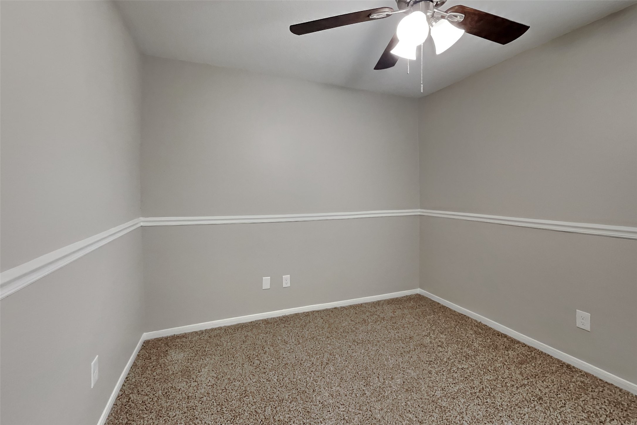 16303 Hickory Point Road Houston, TX 77095 - Photo 12 of 21 an empty room with a empty space and a ceiling fan
