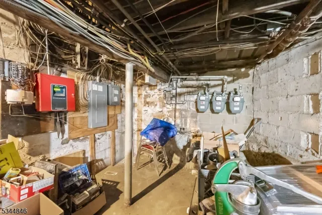 a bathroom with a toilet a sink and a mirror