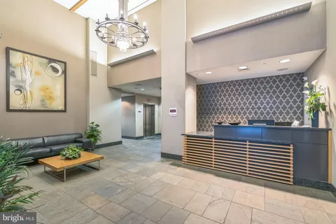 a view of livingroom with furniture and a window