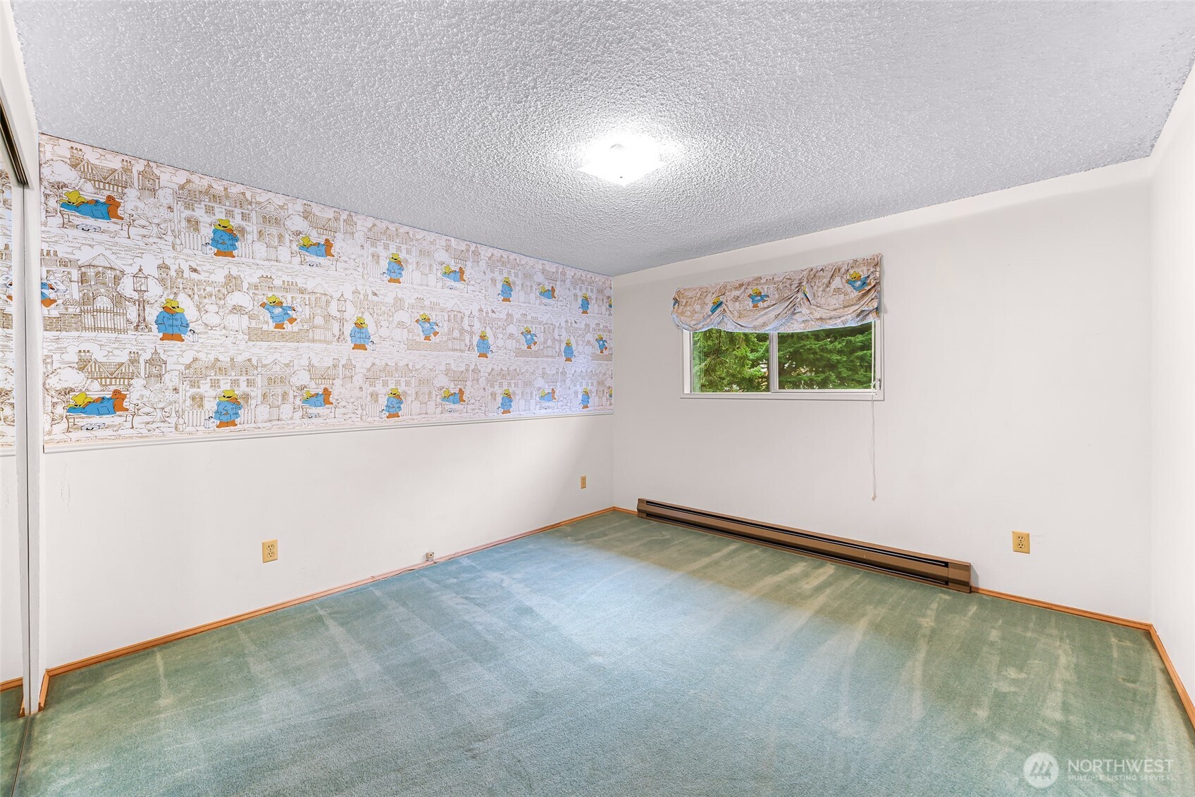1834 Northeast Sumner Drive Oak Harbor, WA 98277 - Photo 15 of 37 a view of kitchen with window and refrigerator