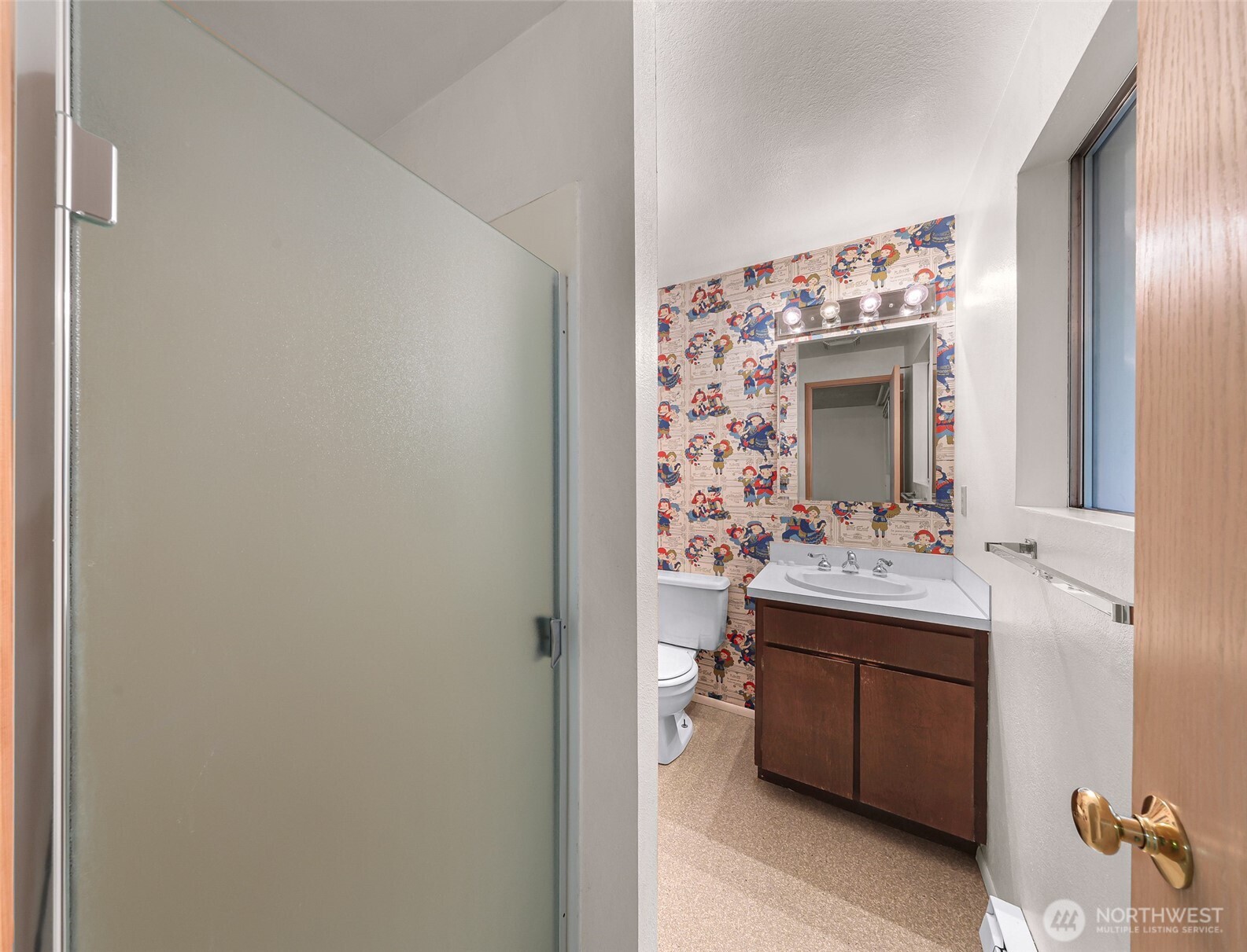 1834 Northeast Sumner Drive Oak Harbor, WA 98277 - Photo 20 of 37 a bathroom with a sink and a mirror