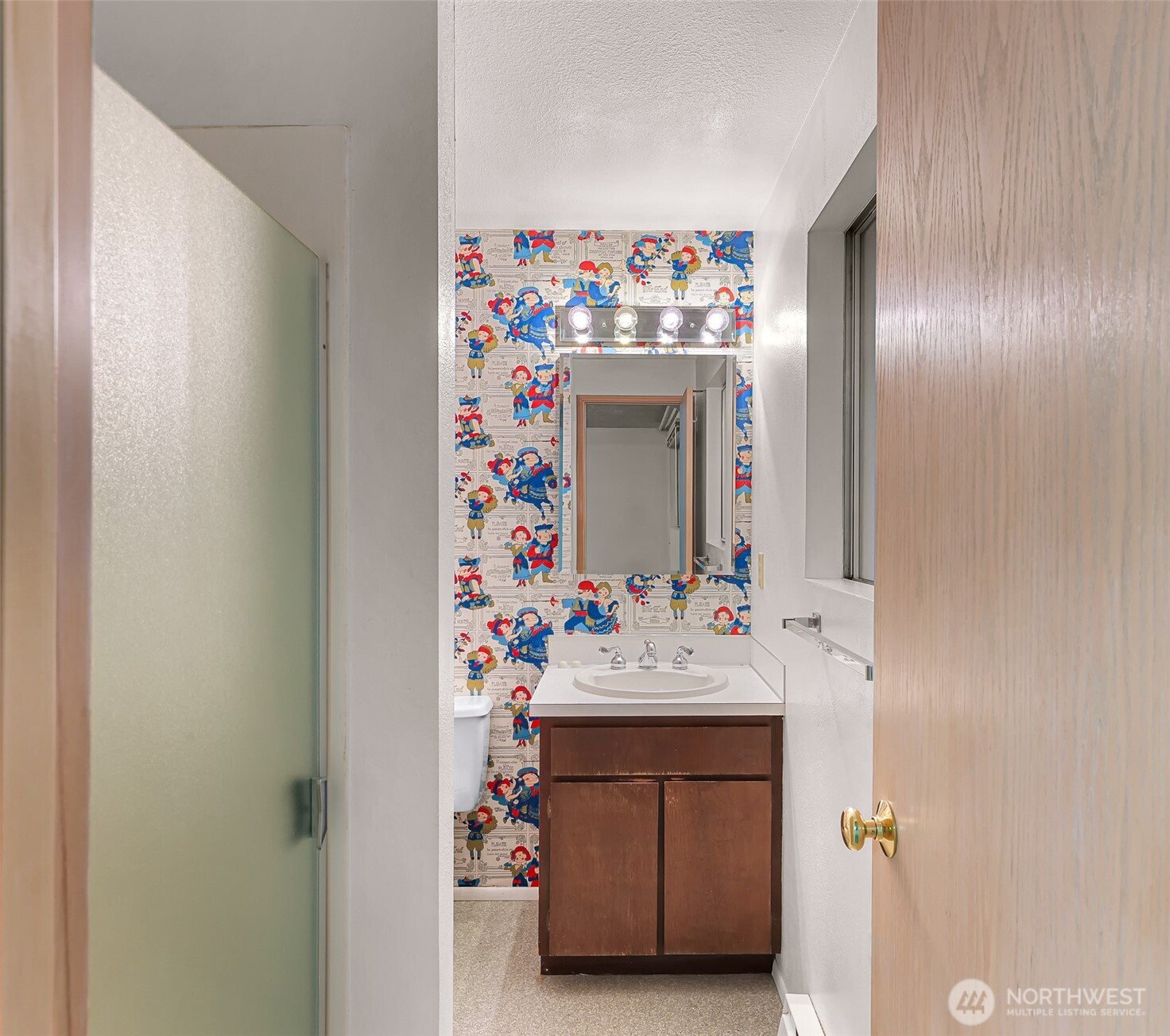 1834 Northeast Sumner Drive Oak Harbor, WA 98277 - Photo 21 of 37 a bathroom with a sink vanity and a mirror