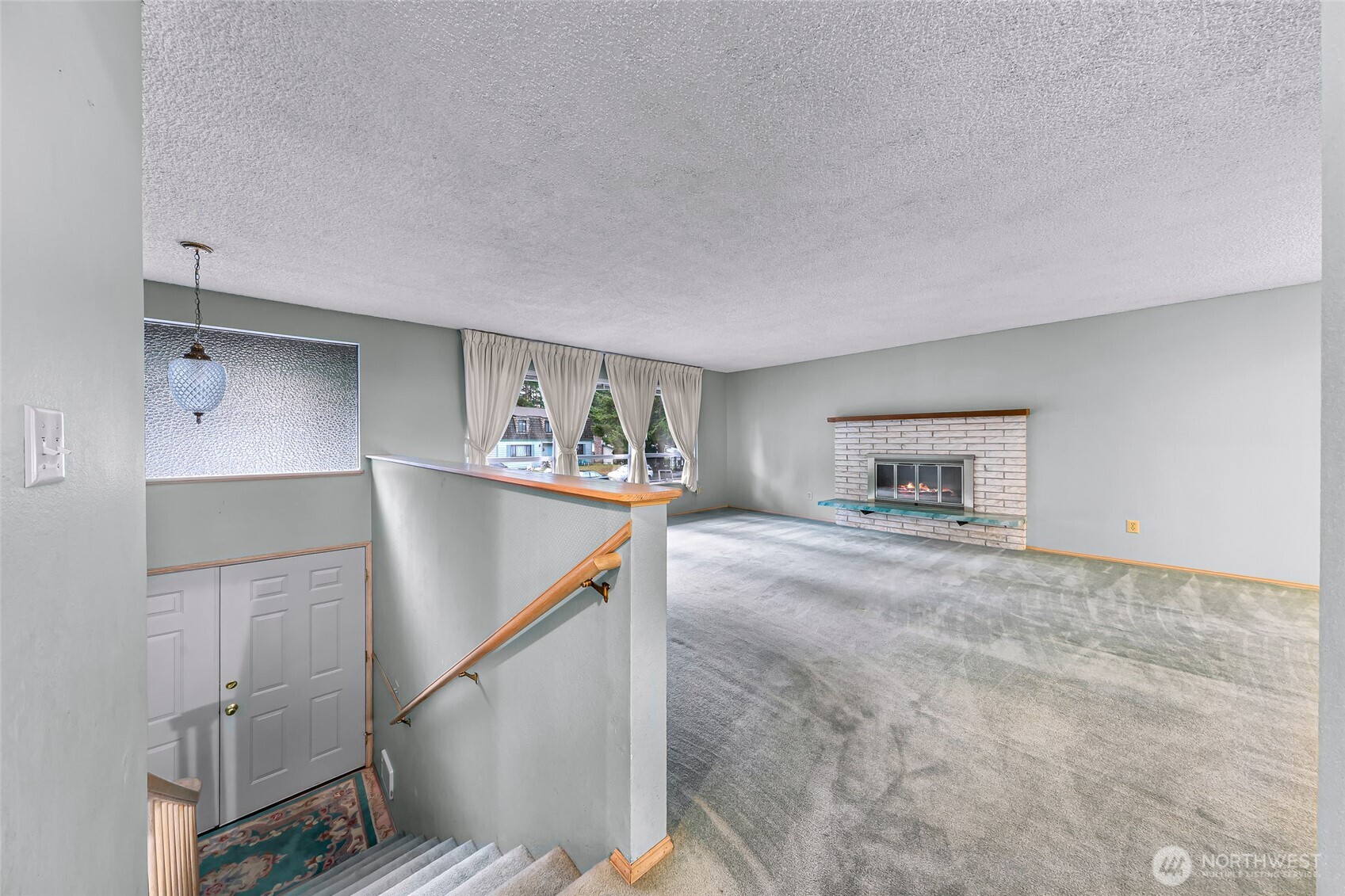 1834 Northeast Sumner Drive Oak Harbor, WA 98277 - Photo 22 of 37 a view of a hallway to a livingroom with furniture
