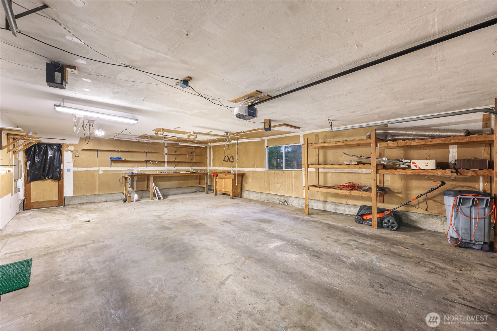 1834 Northeast Sumner Drive Oak Harbor, WA 98277 - Photo 30 of 37 a view of a room with wooden area