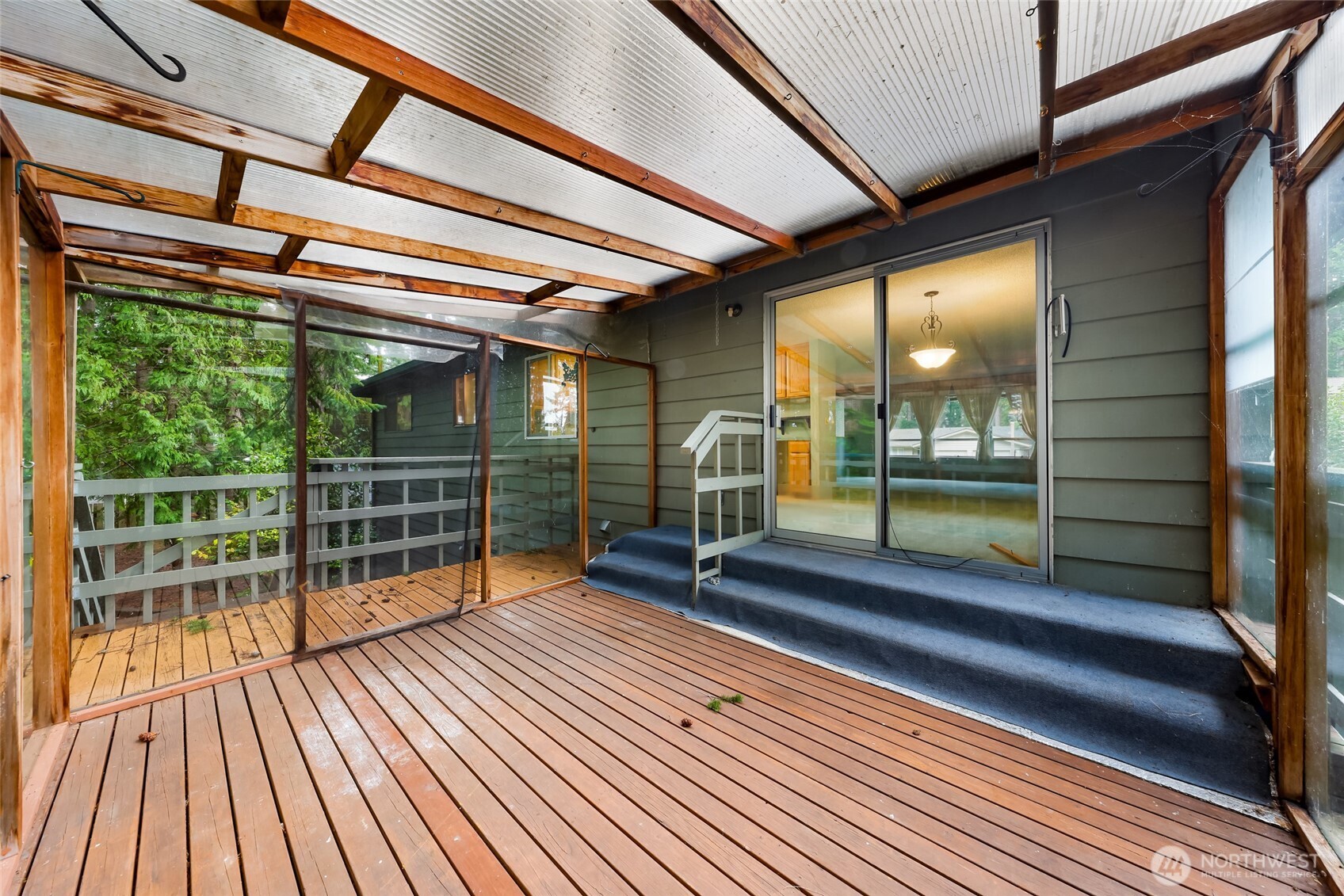1834 Northeast Sumner Drive Oak Harbor, WA 98277 - Photo 32 of 37 a view of a balcony with wooden floor