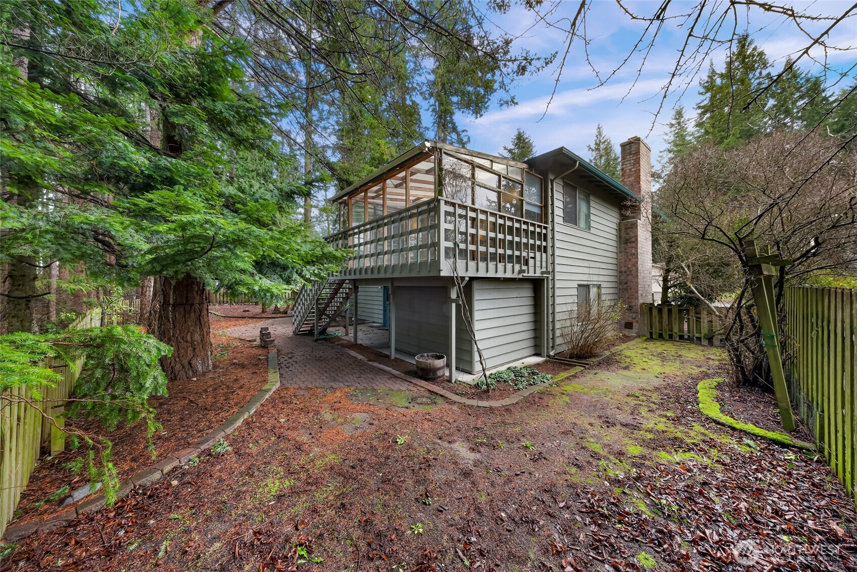1834 Northeast Sumner Drive Oak Harbor, WA 98277 - Photo 33 of 37 a view of a house with a yard and tree