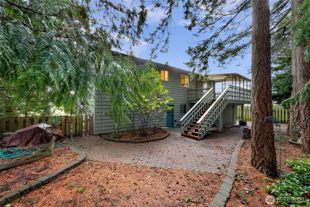 a backyard of a house with lots of green space
