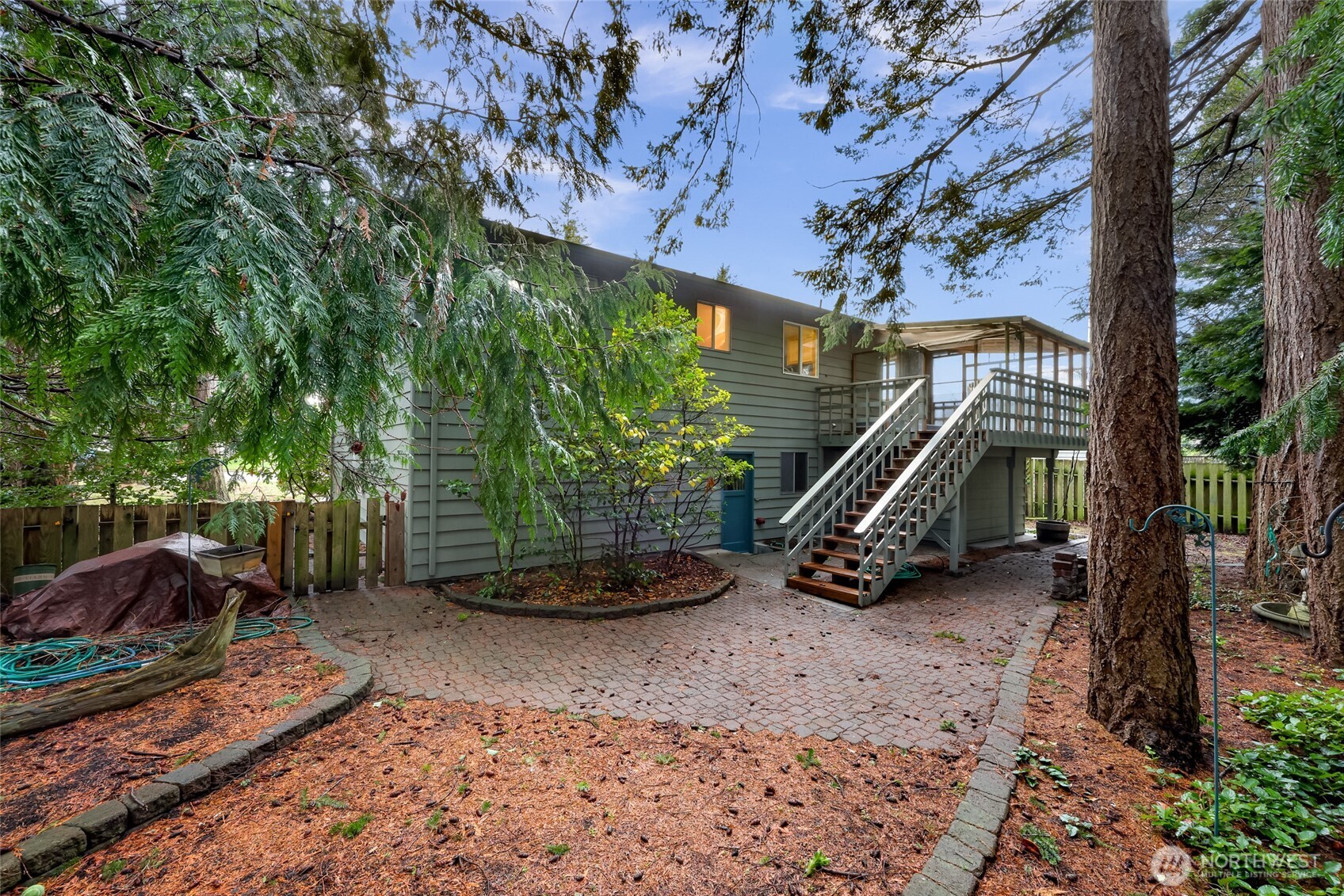 1834 Northeast Sumner Drive Oak Harbor, WA 98277 - Photo 34 of 37 a view of a backyard with a slide
