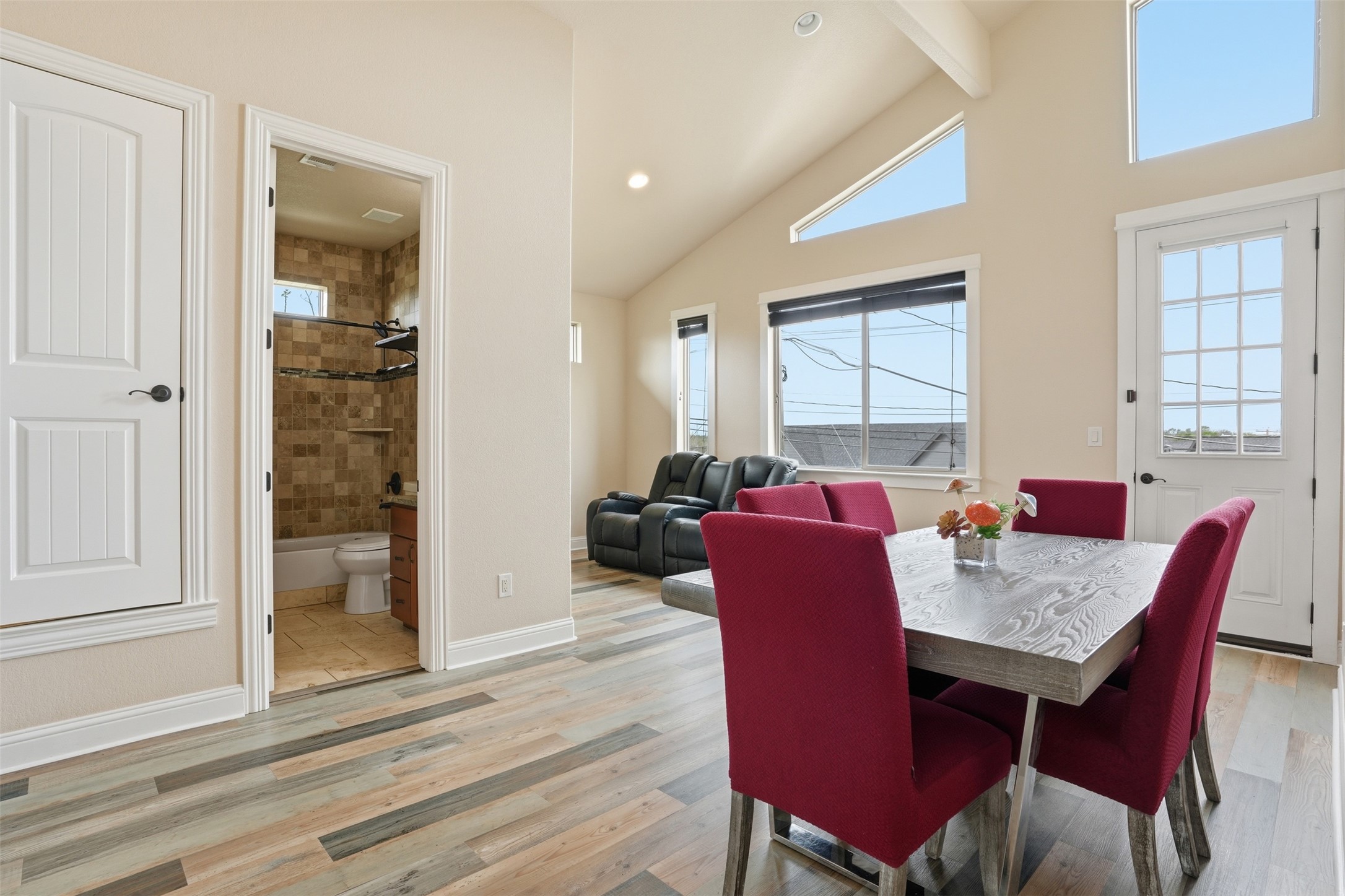 1185 Springdale Road Austin, TX 78721 - Photo 16 of 32 a view of a dining room with furniture window and wooden floor