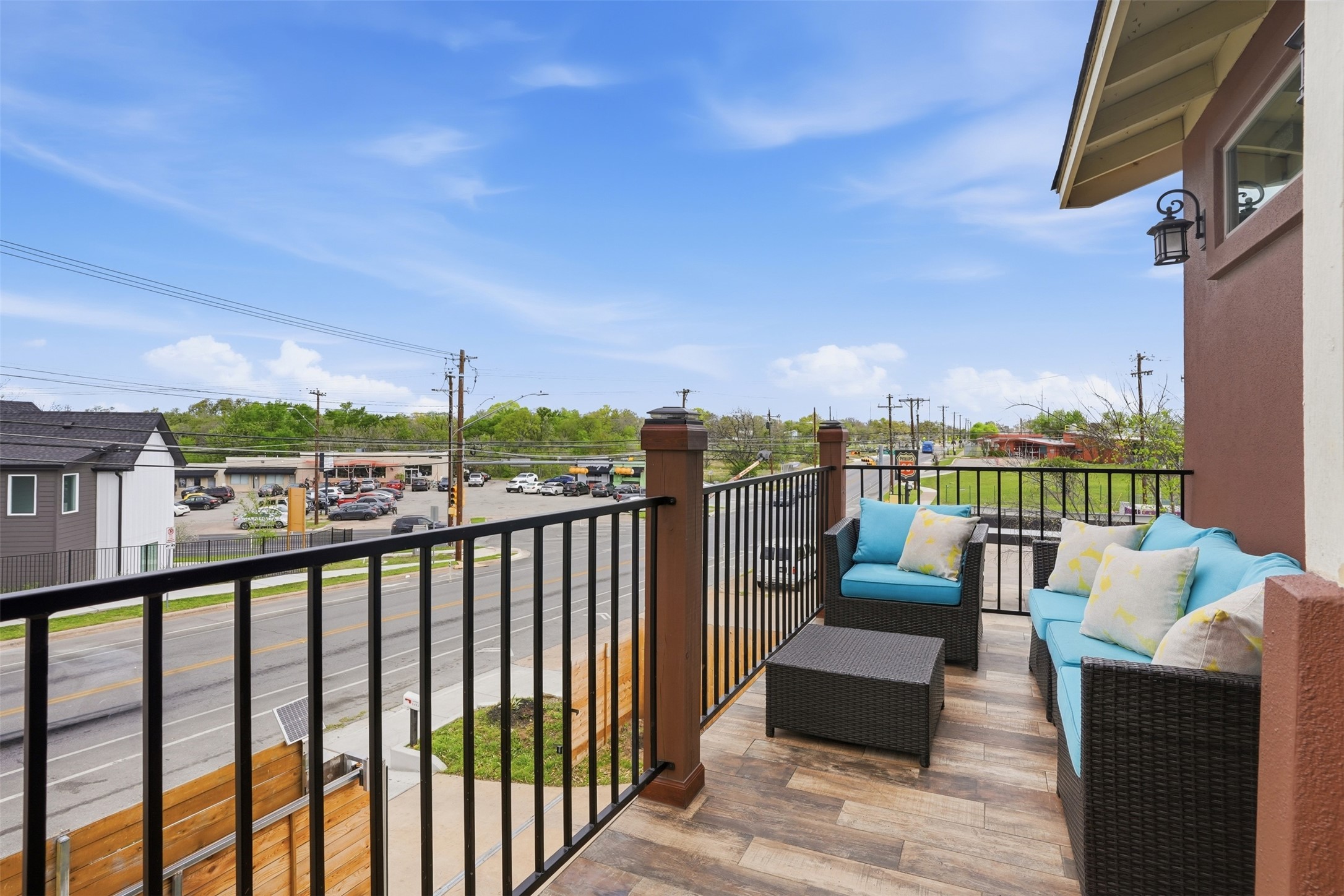1185 Springdale Road Austin, TX 78721 - Photo 10 of 32 a view of city from a balcony with seating space