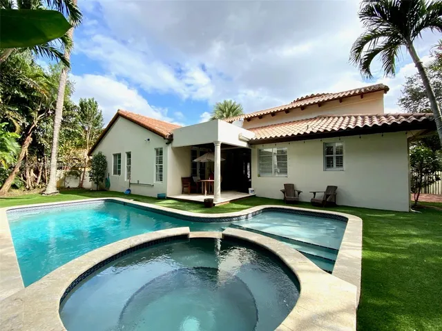 a view of a swimming pool from a balcony