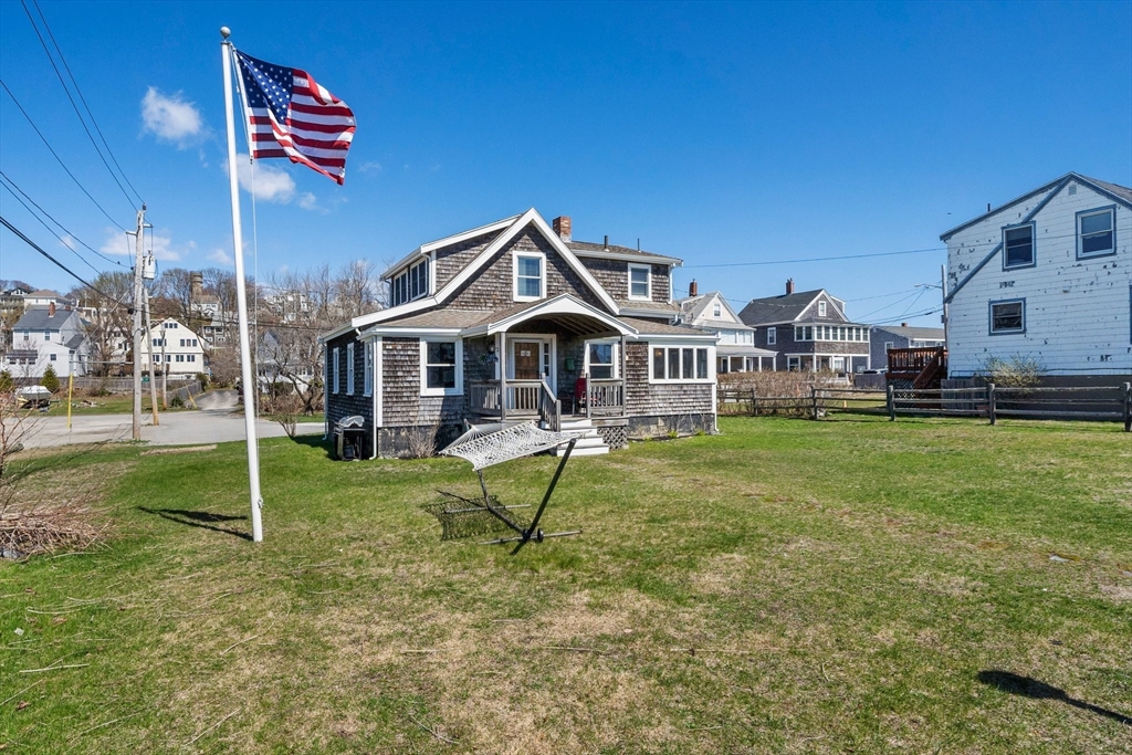3 W Street, Unit SUMMER Hull, MA 02045 - Photo 1 of 1 a house view with a garden space
