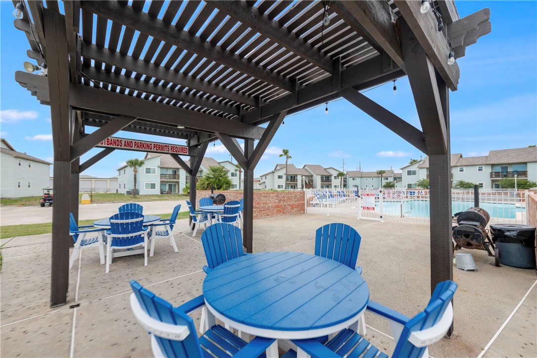 230 Cut-Off Road, Unit 101 Port Aransas, TX 78373 - Photo 27 of 30 a view of porch with seating space