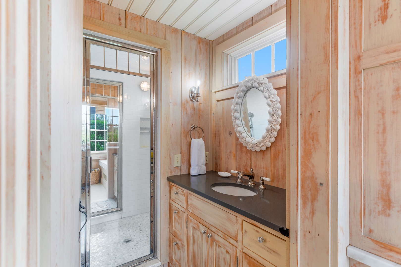 3 North Gully Road Nantucket, MA 02554 - Photo 21 of 43 a bathroom with a sink and a mirror