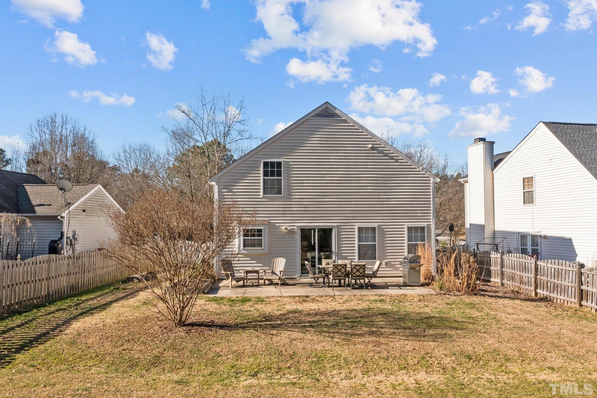 506 Ashford Lane Durham, NC 27713 - Photo 19 of 27 a front view of a house with garden