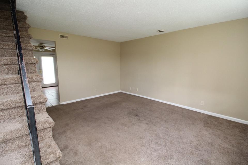 1088 Pembroke Oak Grove Road, Unit 21 Oak Grove, KY 42262 - Photo 2 of 6 an empty room with windows