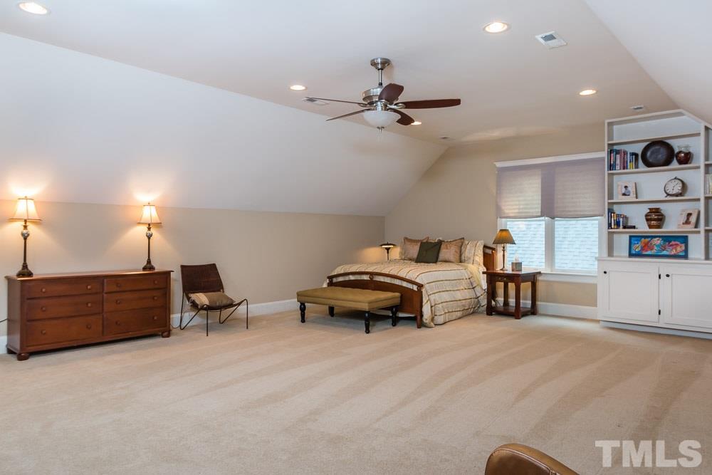 3048 Farrior Road Raleigh, NC 27607 - Photo 20 of 25 a bedroom with furniture and a bed