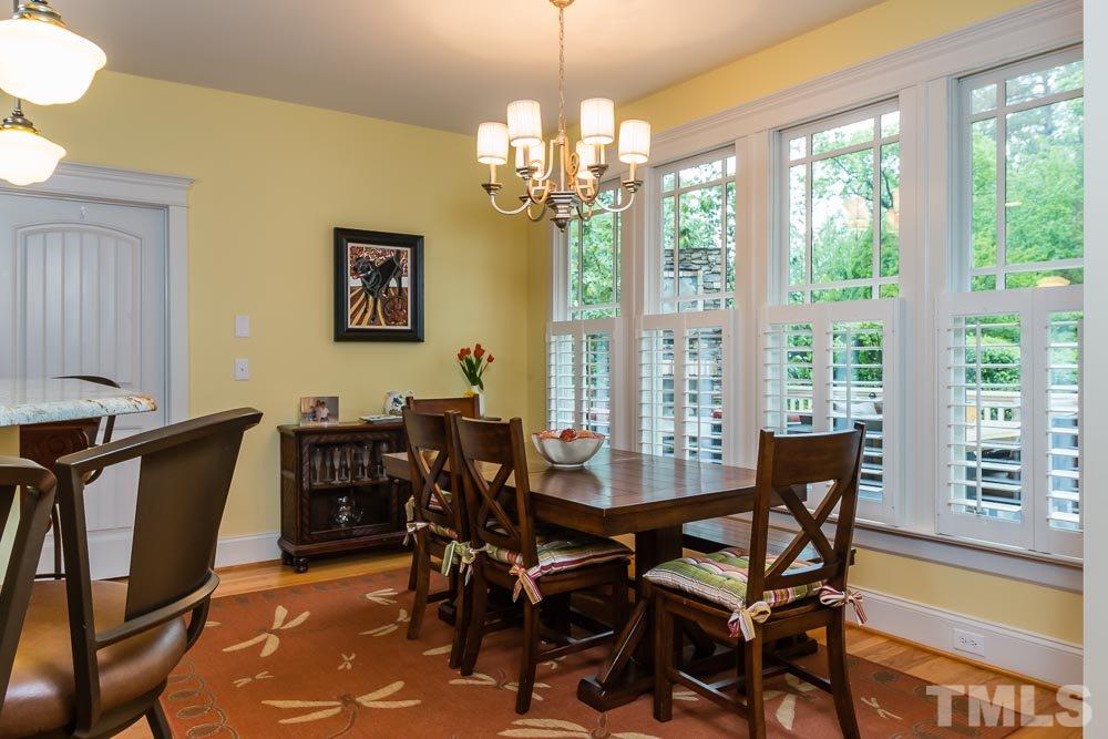 3048 Farrior Road Raleigh, NC 27607 - Photo 5 of 25 a view of a dining room with furniture window and outside view