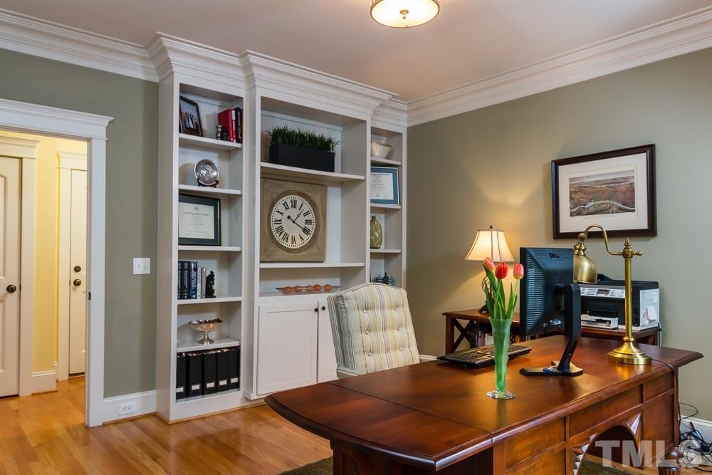 3048 Farrior Road Raleigh, NC 27607 - Photo 9 of 25 a work room with furniture and wooden floor