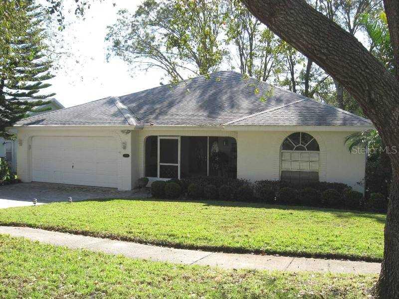 3432 Stirling Road Palm Harbor, FL 34684 - Photo 1 of 1 Exterior Front - Stirling Rd. Overlooks the Pond
