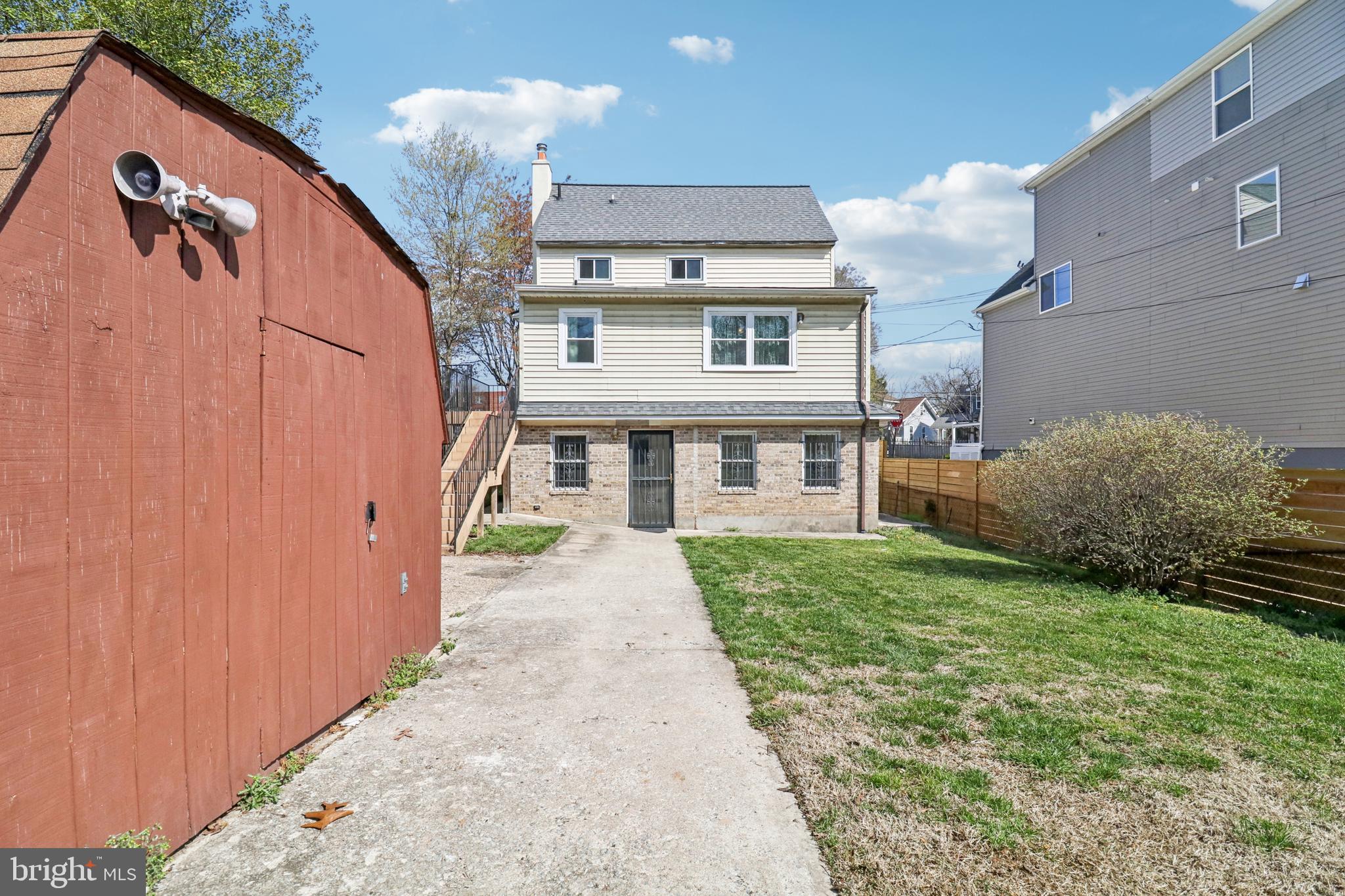 3149 Newton Street Northeast Washington, DC 20018 - Photo 57 of 57 Yard has 3 car parking at back w/exit to alley