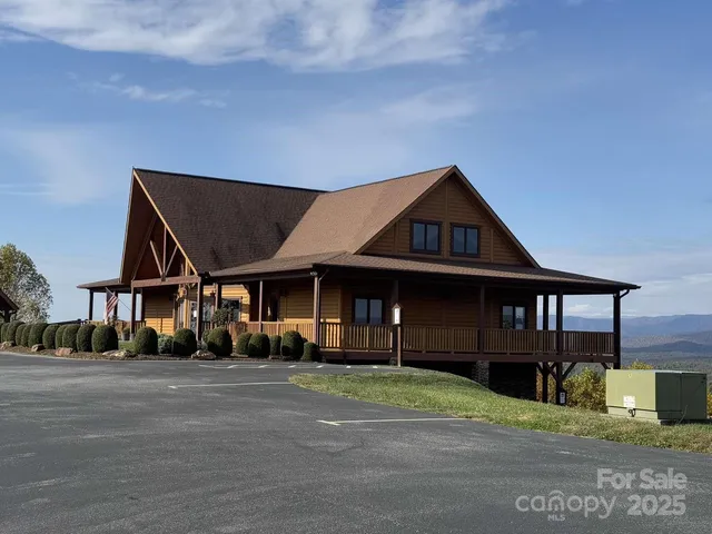 a view of swimming pool with a yard