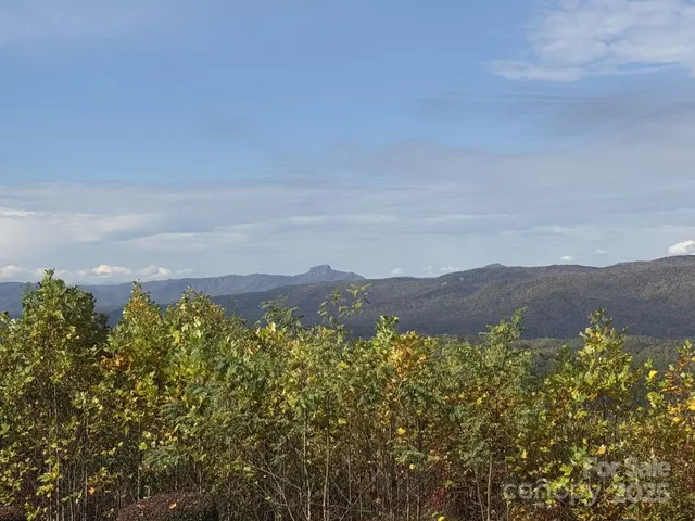 a view of mountain with lake view