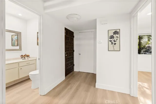 a bedroom with a bed and a workspace