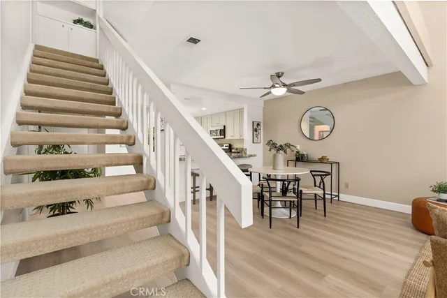 an aerial view of a house with a garden and plants