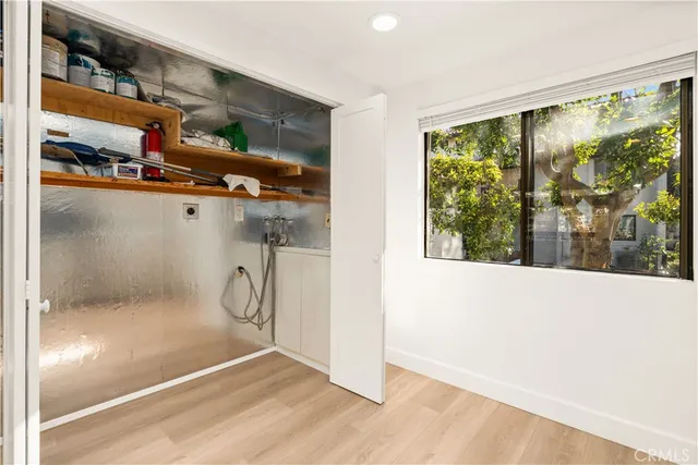 a view of a livingroom with furniture and a chandelier