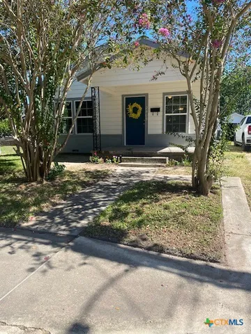 a view of a house with a swimming pool