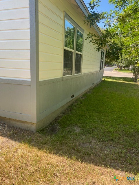 2405 Lone Tree Road Victoria, TX 77901 - Photo 11 of 13 a view of a house with a backyard