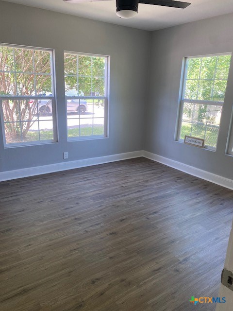 2405 Lone Tree Road Victoria, TX 77901 - Photo 6 of 13 a view of room with window and wooden floor