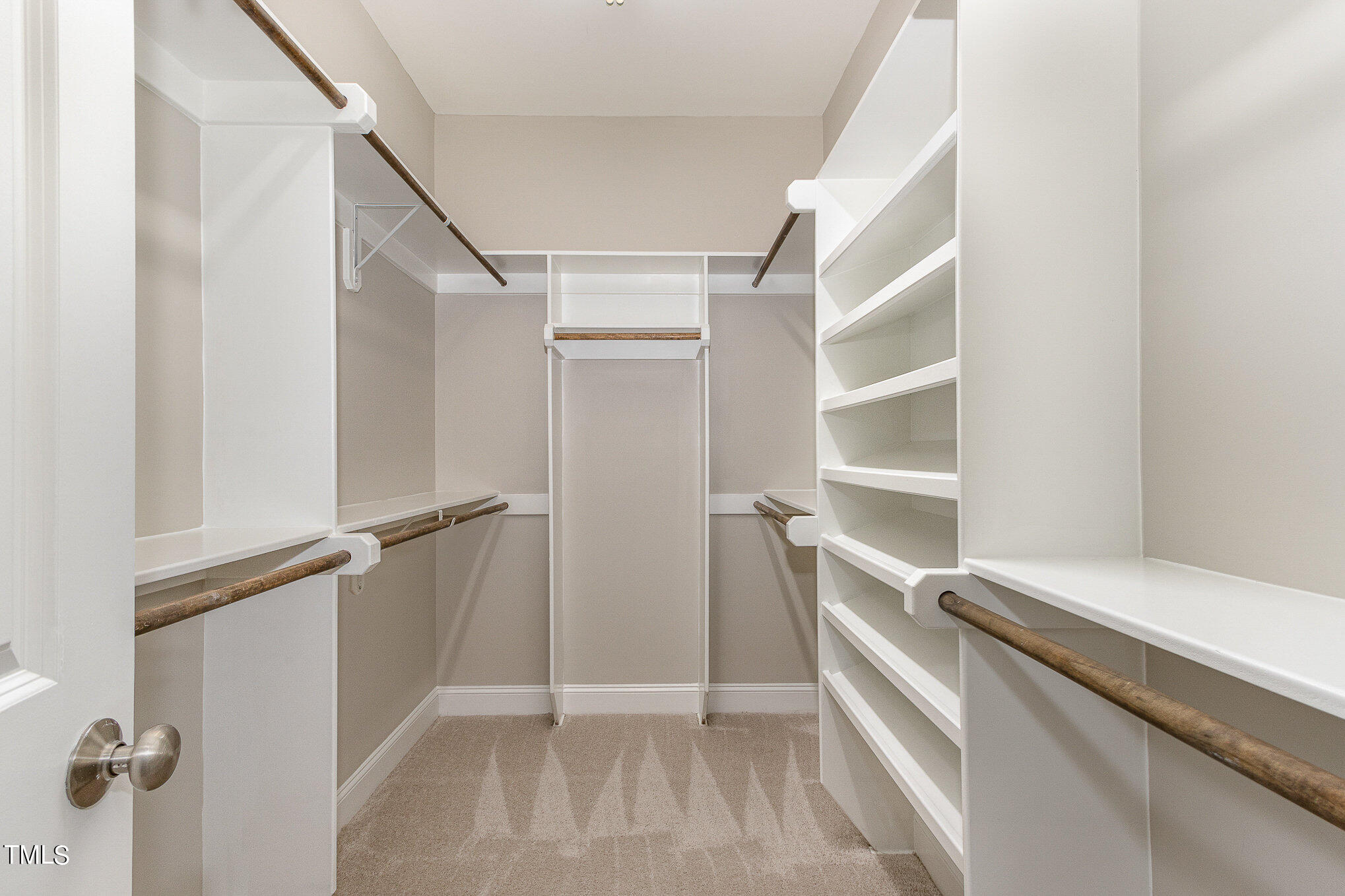 3640 Pineview Circle Durham, NC 27705 - Photo 30 of 41 a view of walk in closet with empty racks